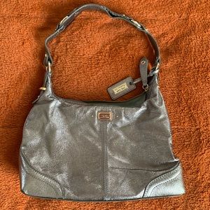 The Sak purse in dark gray metallic